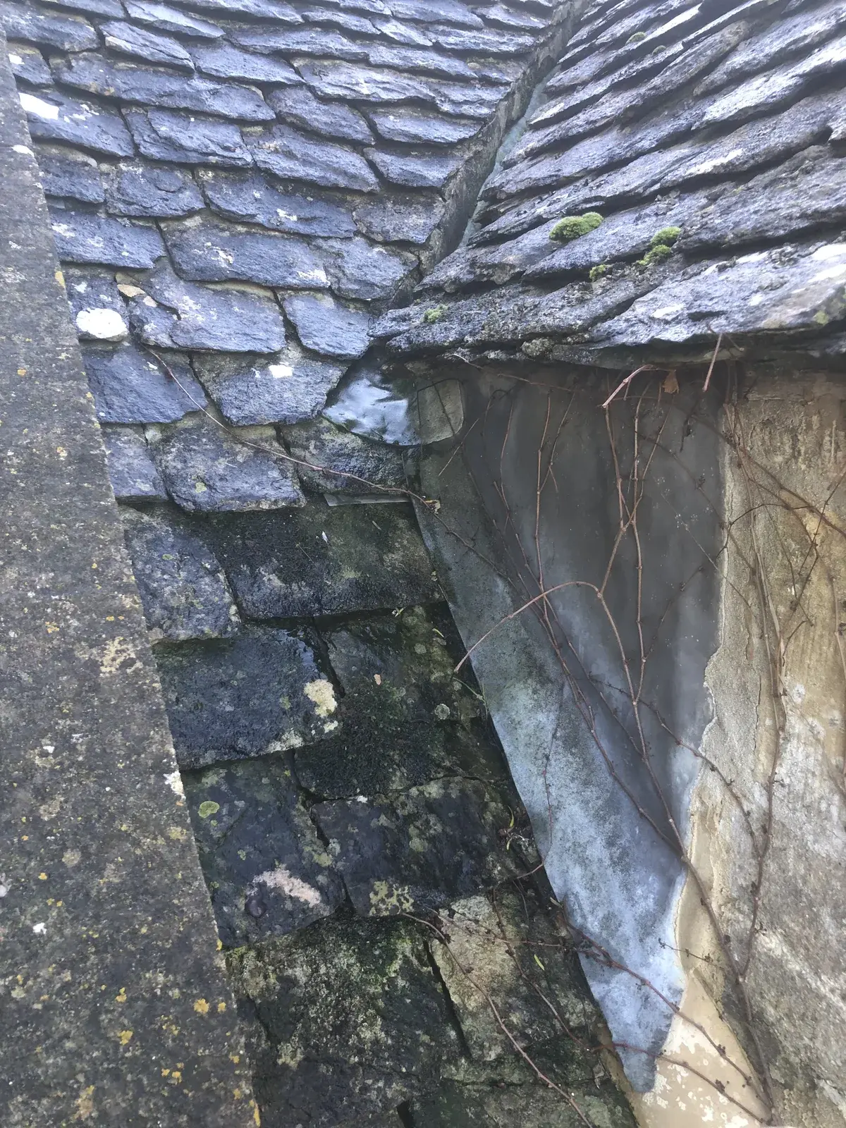 Old leadwork and missing cement at a dormer cheek valley junction