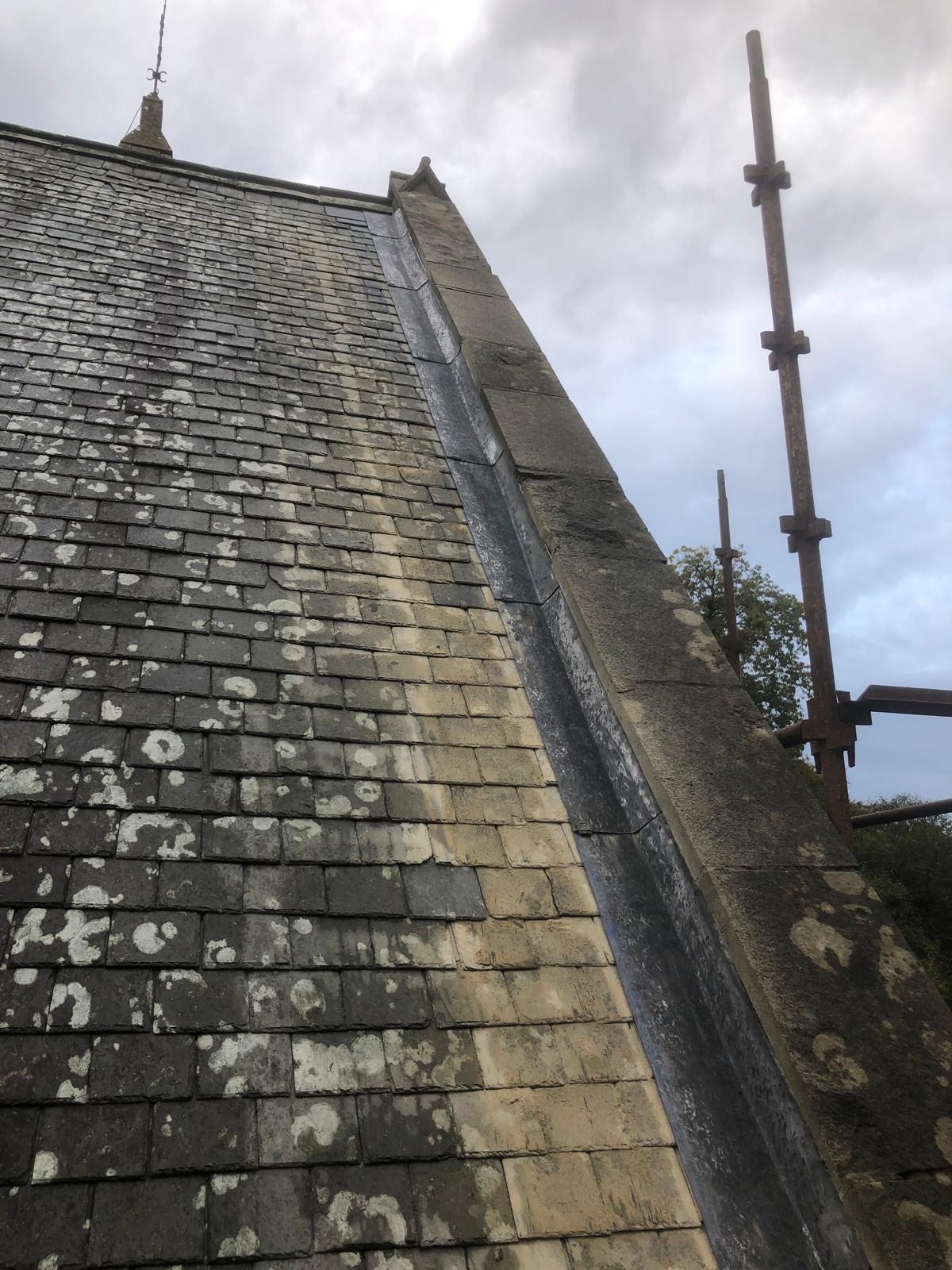 New stepped leadwork fitted between Welsh slates and coping stones
